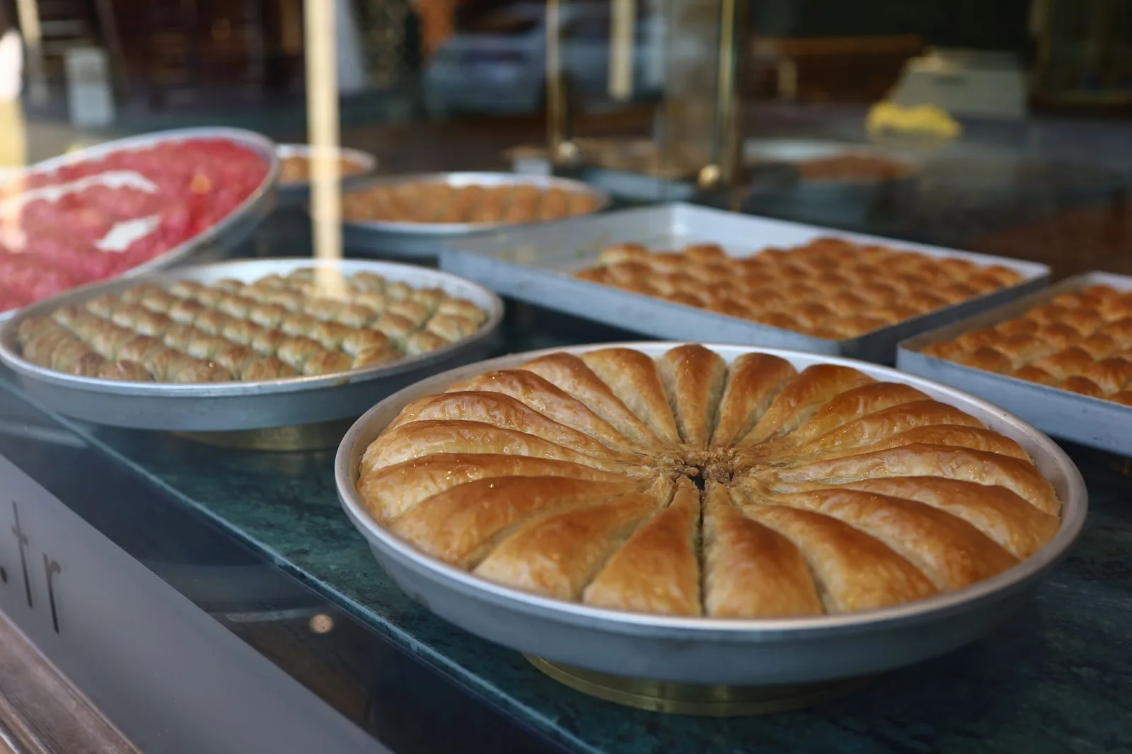 Trays of baklava in a pastry shop window
